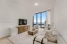Floor-to-ceiling windows with water, harbor, and boat slip scenery, recessed ceiling lighting, and wood-finish flooring