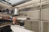 Den converted into custom walk-in closet for primary