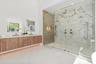 Custom cabinets with dual vanities and down lighting