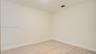 Neutral-toned interior space featuring light-colored wood-finish flooring and smooth wall surfaces