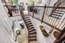 Head upstairs to your main living room, multiple dining areas, kitchen and powder room