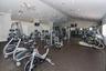Fitness center featuring vaulted ceilings, recessed lighting, ceiling fans, and rubberized flooring