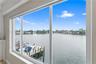 Large format picture window, waterfront exposure, and deep-water dockage