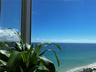 Floor-to-ceiling windows featuring panoramic ocean and coastline exposure