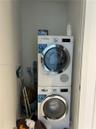 Stackable white Bosch front-load washer and dryer unit