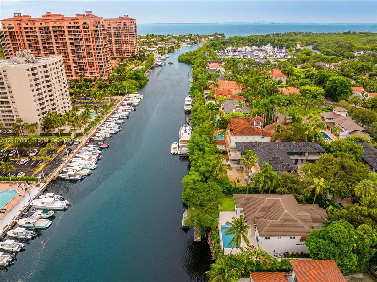 Waterfront property featuring a private swimming pool, deep-water canal access, and proximity/no bridges to open bay waters
