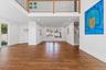 Living room looking up to mezzanine level