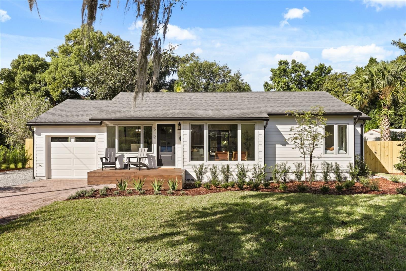 East facing view of beautiful bungalow.