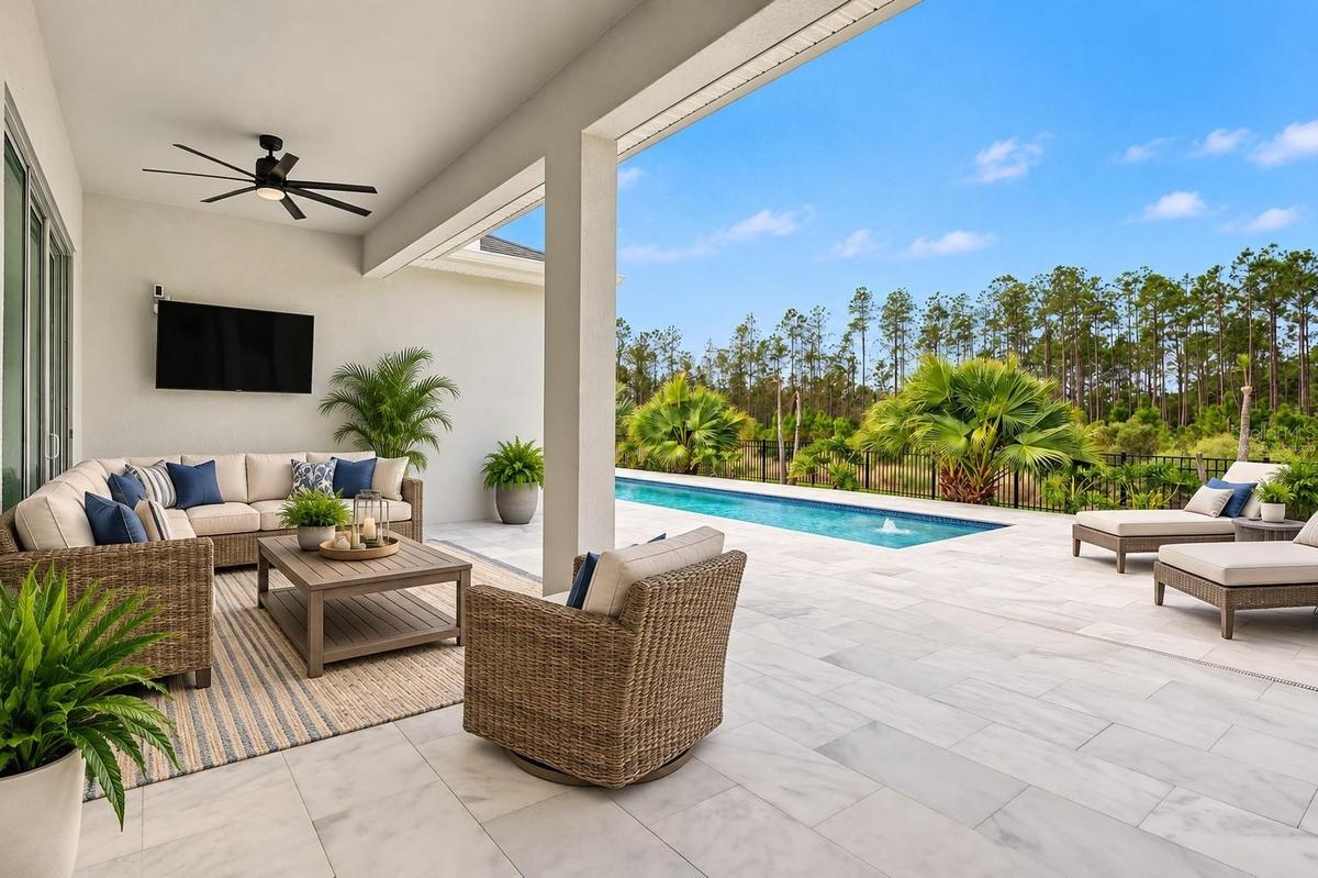 Expansive patio area with a covered area for those warmer days. Virtually staged.