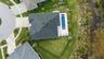 Lot placement with backyard natural barrier