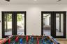 Double french doors make for an inviting entertaining space.