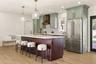Chef's kitchen with large island and leading out to outside deck.