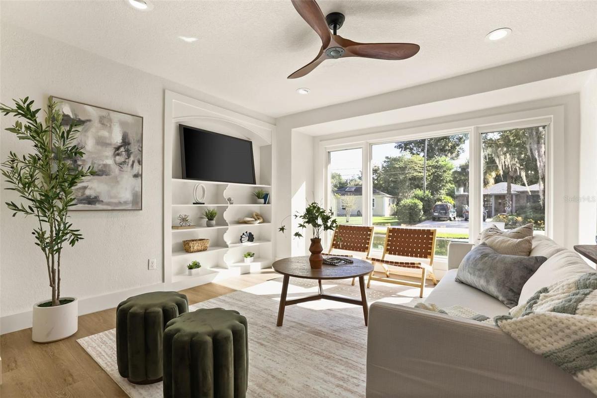 Living room area just off the front door with natural light abound.