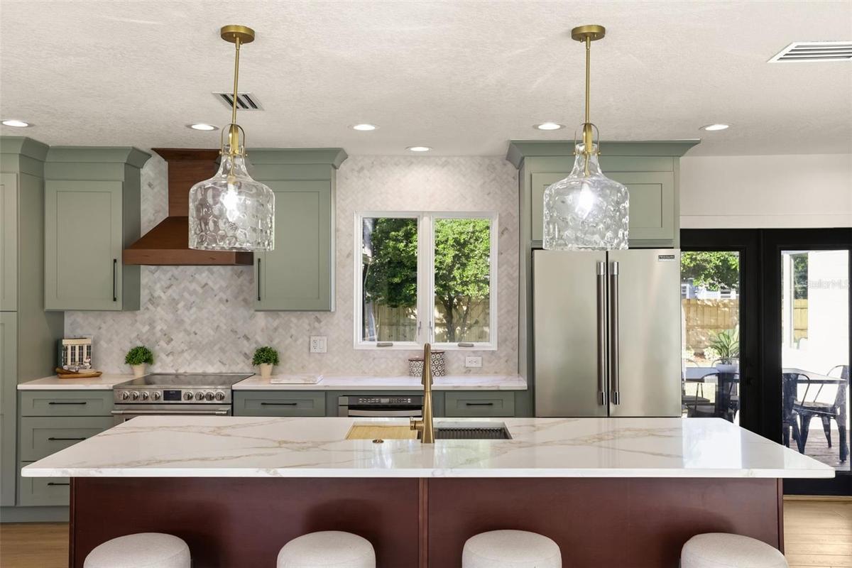 Luxury lighting and accent touches make this home shine.