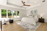Primary bedroom opening out to your backyard oasis.