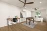 3rd bedroom, home office or flex space.  Opens out to backyard and covered porch.