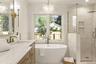 Luxurious soaker tub with a Tabebuia tree just outside and a spa shower.