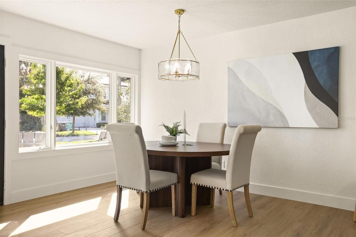 Dining room area with elegant lighting.