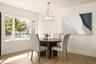 Dining room area with elegant lighting.