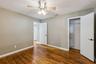 Secondary bedroom with walk in closet