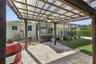 Sturdy Gazebo for all your grills!  Ceiling fan and power on a pole complete this area for your outdoor grilling needs