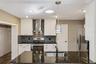 Modern updated kitchen with range hood