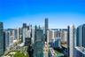 Elevated urban perspective showcasing the surrounding metropolitan skyline, high-rise architectural density, and expansive horizon