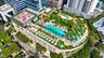 Rooftop deck featuring a swimming pool, wading area with palm trees, manicured landscaping, and a putting green