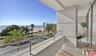 Penthouse balcony faces ocean