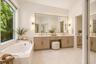 Virtually staged primary en-suite bathroom
