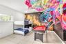 Room featuring tile flooring, recessed lighting, and a large-scale wall mural