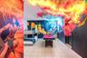 Interior space featuring tile flooring, recessed ceiling lighting, and custom wall murals