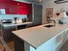undermount sink with a matte black faucet