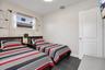 Residence 1753 (Right Side) – Bedroom 4 closet to the outdoor pool area and can be used as an office/flex space.
