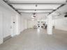 Split car garage accommodates cars, golf carts, beach toys