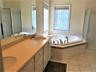 PRIMARY BATRHOOM w/DOUBLE SINKS/SOAKING TUB