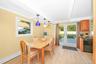 With French sliding doors leading to backyard
