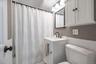 Hall bath with tub