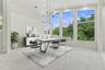 This bonus space is perfect for dining, game room or an entertainment bar. Virtually staged.