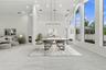 Imagine entertaining with views out these stunning windows overlooking the pool and natural preserve. Virtually staged.