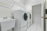 Interior laundry room and utility sink.