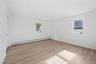 View of unfurnished bedroom four