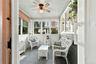 French door off of dining room to enclosed porch