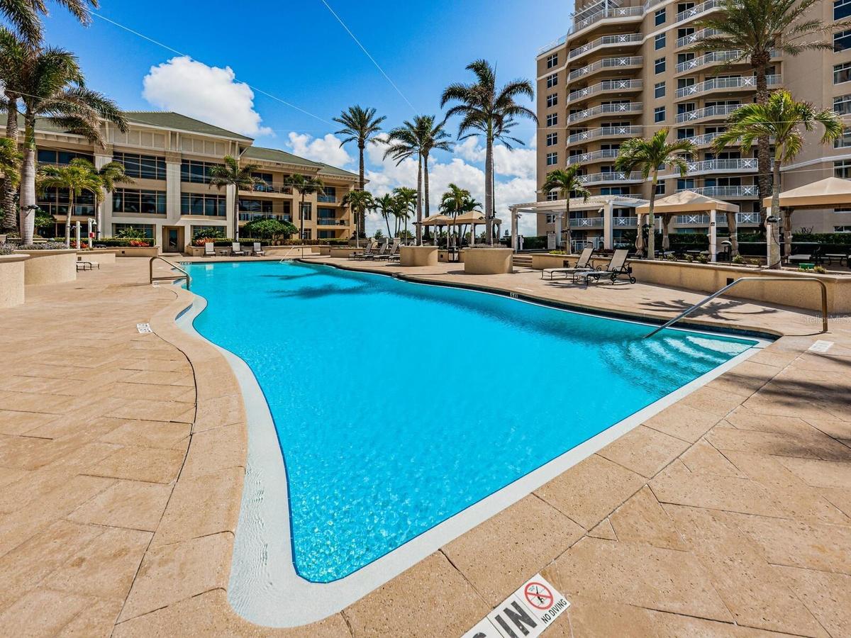 Amenities include Gated Entry, Courteous Concierge, Gulf Front Heated Pool with Cabanas, Fitness Center, Social Library and more!