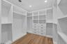 Primary closet with organizer