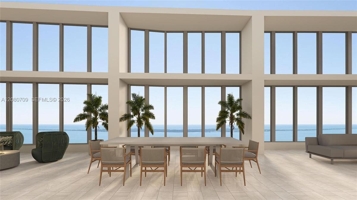 Expansive floor-to-ceiling windows, high-volume ceilings, neutral large-format tile flooring, and integrated structural columns