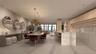 Kitchen featuring light-tone wood cabinetry, stone-finish waterfall island with breakfast bar seating, recessed lighting, and floor-to-ceiling windows
