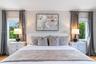 Filled with natural light and greenery, Symmetrical windows, natural wood flooring