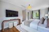 Wood-finish flooring, neutral wall tones, recessed ceiling lighting, and a drum-style pendant light fixture