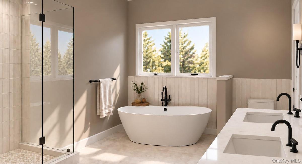 Primary Bathroom | Virtually Staged & Digitally Enhanced – Luxurious, spa-inspired retreat featuring a freestanding soaking tub, glass-enclosed shower